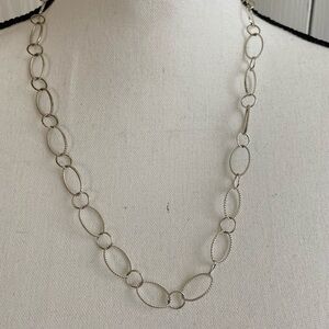Open link necklace with lobster clasp closure